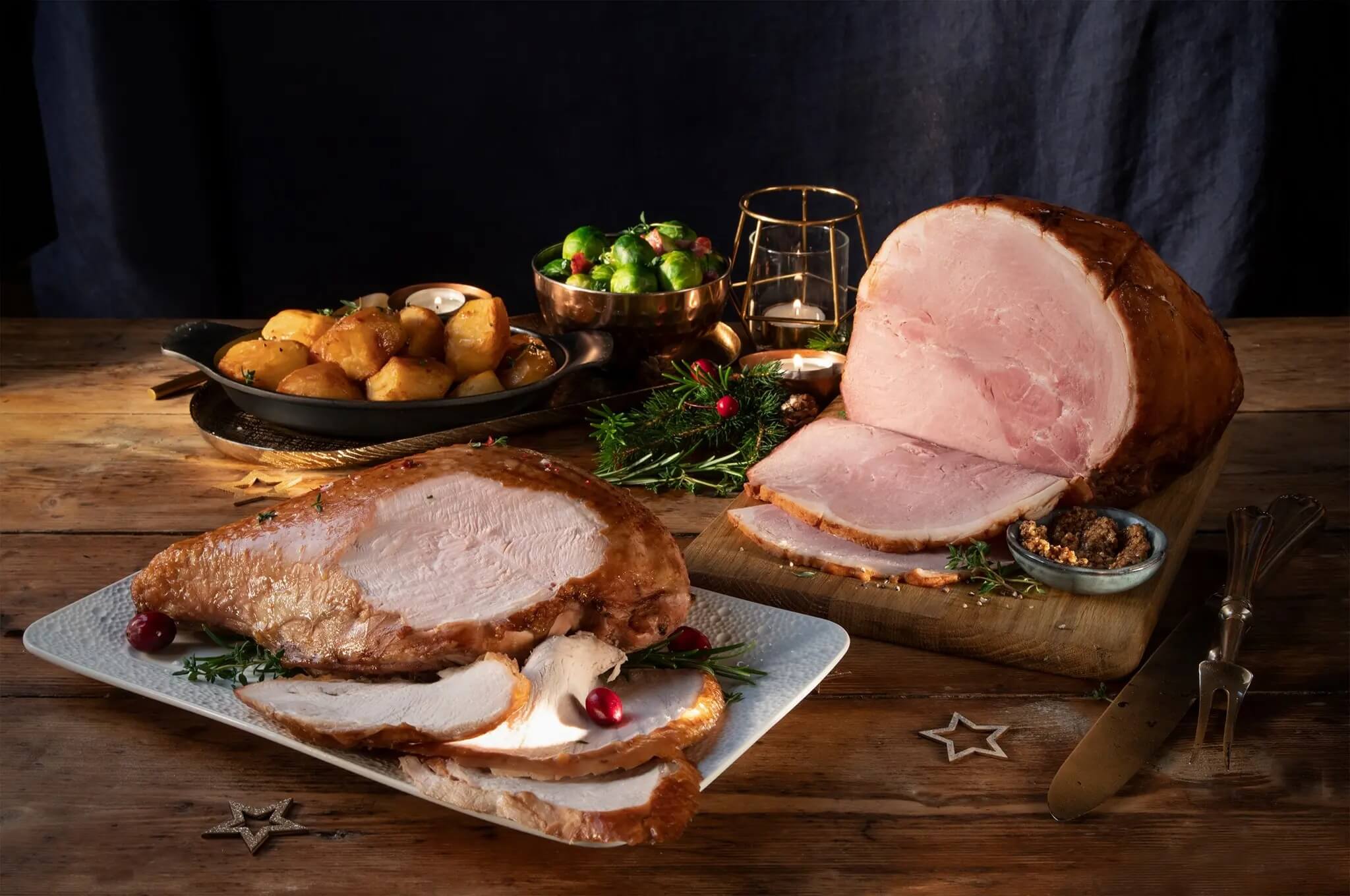 Turkey and ham presented on a table for Christmad dinner